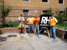 Installing flagpoles, August 2009