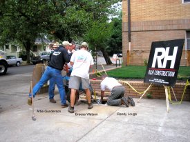 Installing flagpoles, August 2009