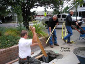 Installing flagpoles, August 2009